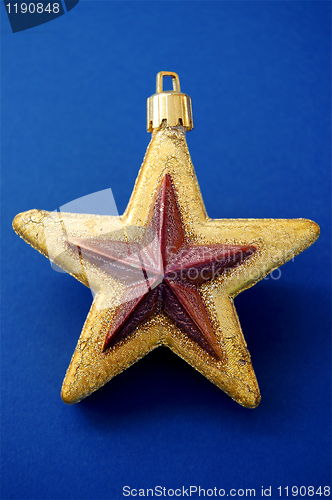 Image of Christmas tree golden star decoration