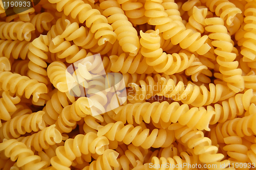 Image of Eliche twirls pasta background