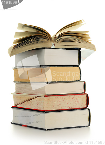 Image of Composition with books on the table isolated on white
