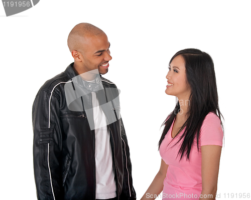 Image of Smiling girl and guy looking at each other