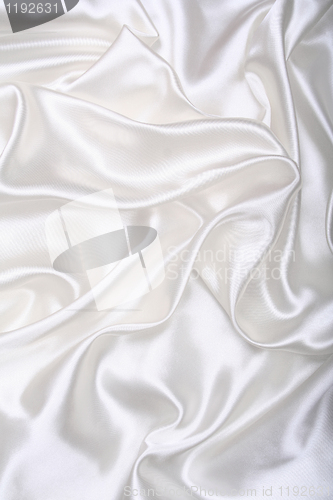 Image of Smooth elegant white silk as background 