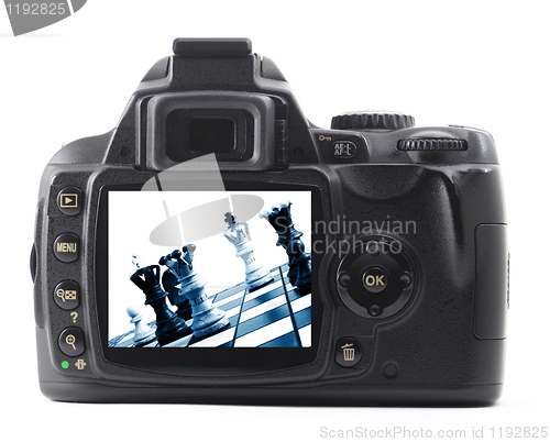 Image of digital camera and chess