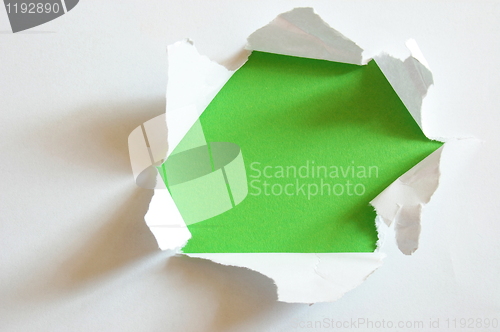 Image of green hole in blank sheet paper