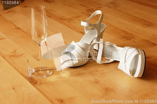 Image of sexy high heel and champagne glass