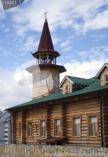 Image of wooden house with tower