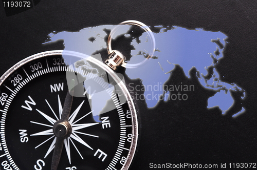 Image of compass and world map