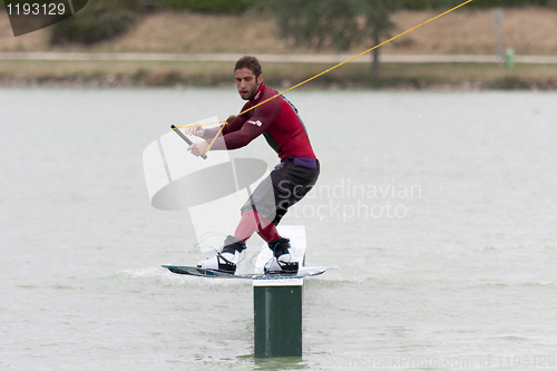 Image of Wakeboarder riding his wakeboard