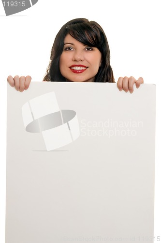 Image of Woman smiling with advertising sign