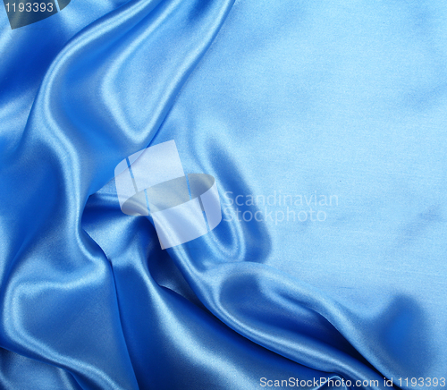 Image of Smooth elegant blue silk as background 