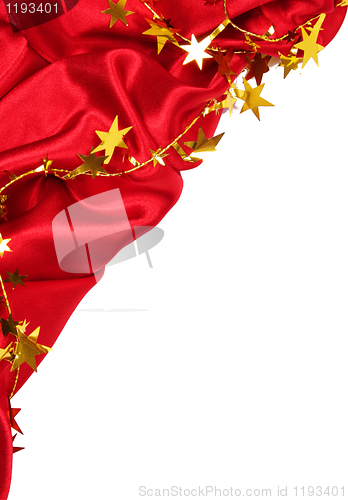 Image of Smooth Red Silk with golden stars as holiday background 