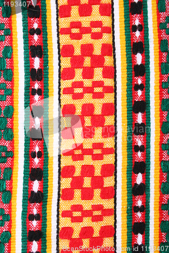 Image of Red, yellow and green knitted textured as background 