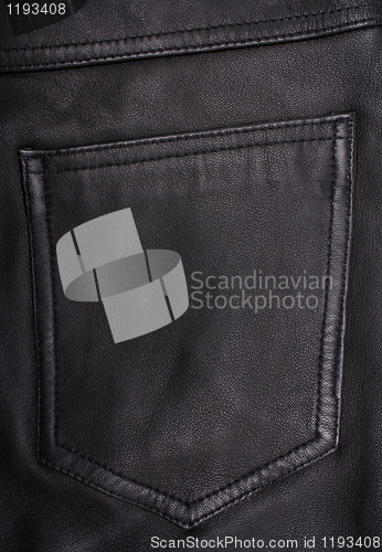 Image of Pocket on the black leather texture as background 