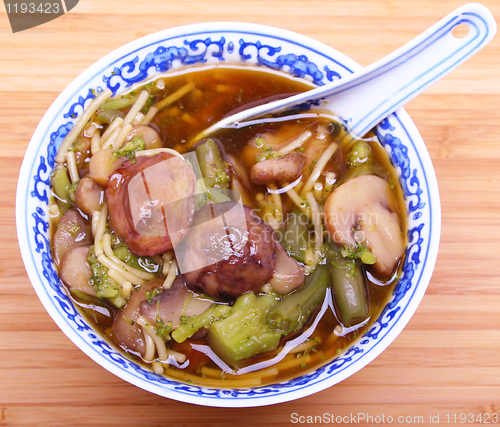 Image of Vegetarian chinese soup with noodles and mushrooms 