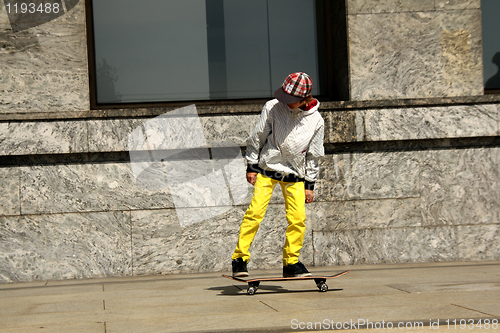 Image of Boy skating in the city