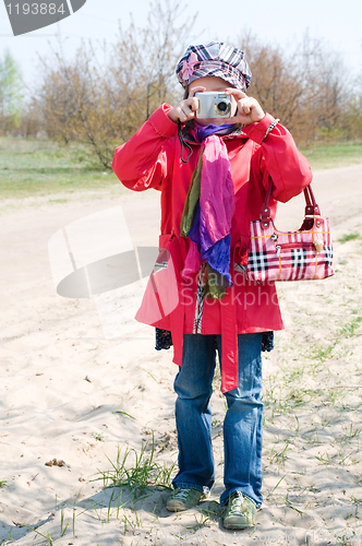 Image of Cute Little Girl Takes Pictures