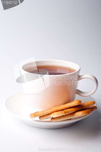 Image of cup of tea and cookies