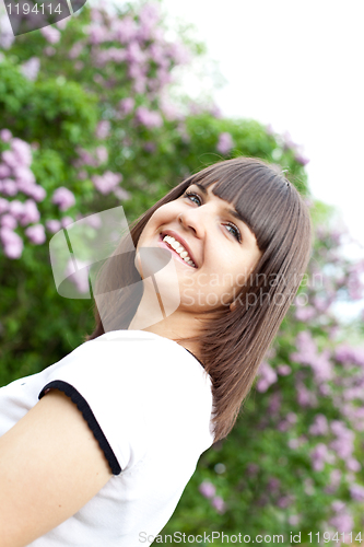 Image of young woman in the lilac park