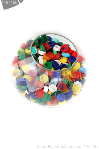 Image of plastic caps in the glass sphere