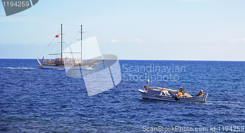 Image of Turkey.Excursion yacht and fishing boat