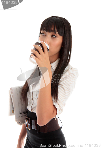 Image of Professional woman drinking coffee