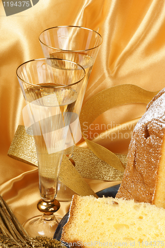 Image of Christmas composition with Pandoro and spumante