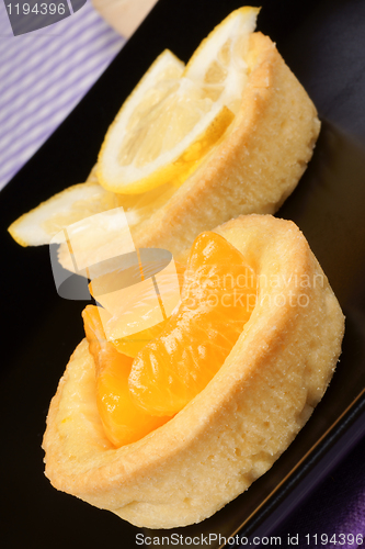 Image of Mini tangerine and lemon fruit tarts