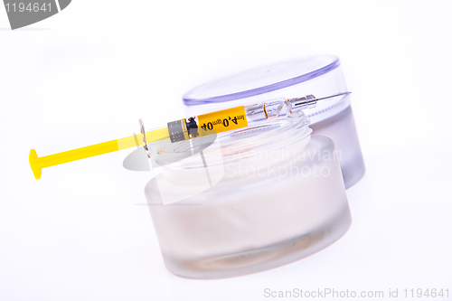 Image of botox cream with syringe