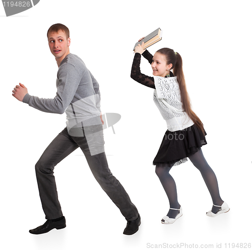 Image of Girl with a book in her hands ran over boyfriend