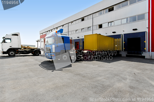 Image of Unloading trucks