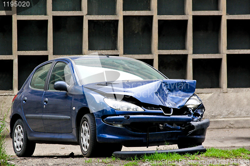 Image of Crashed blue car