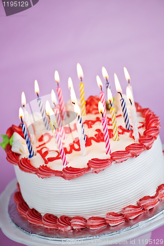 Image of Birthday cake with lit candles