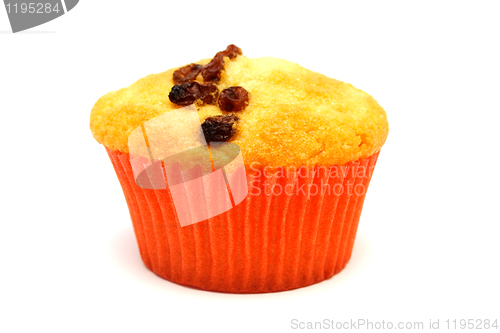 Image of Tasty yellow muffin with many brown raisins