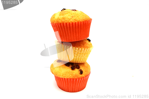 Image of Tasty yellow three muffins on each other