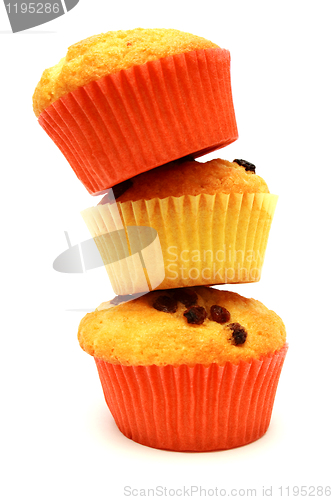 Image of Tasty yellow muffins on standig each other