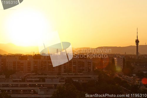 Image of Sunset at suburbs with the shiolhouettes of the city