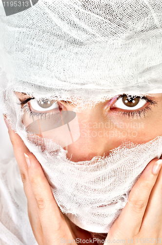 Image of Closeup of a girl wrapped in bondage