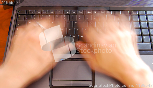 Image of Hands on keyboard, fast typing