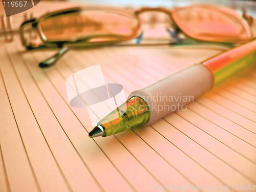 Image of pencil and glasses in red