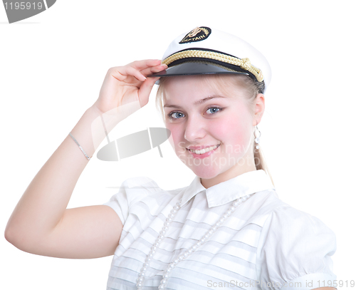 Image of Beautiful girl in the captain's cap