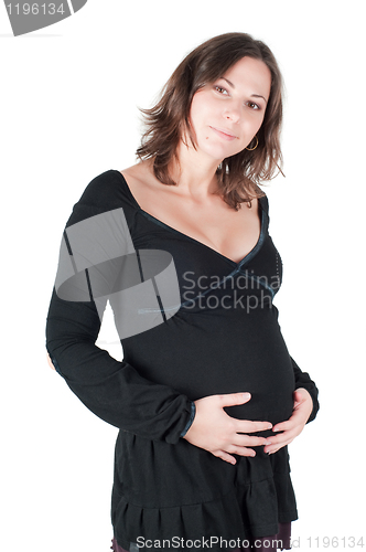 Image of Portrait of pretty pregnant woman in black dress