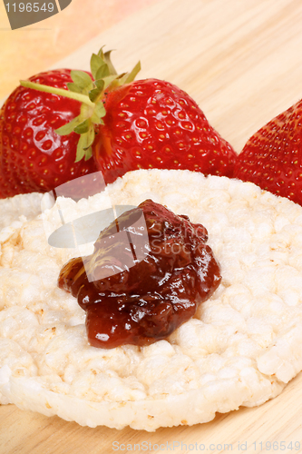 Image of Rice cake with jam and strawberries