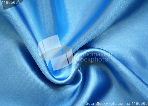 Image of Smooth elegant blue silk as background 