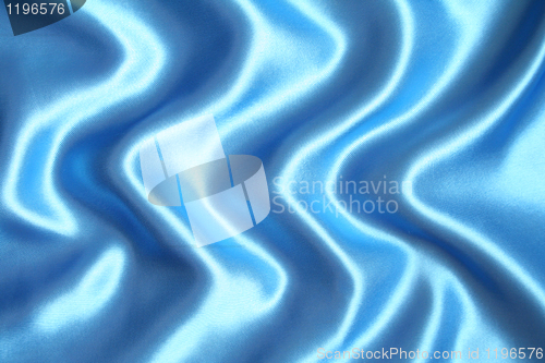 Image of Smooth elegant blue silk as background 