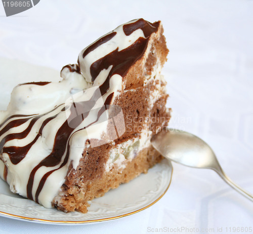 Image of Chocolate and cream cake on the plate