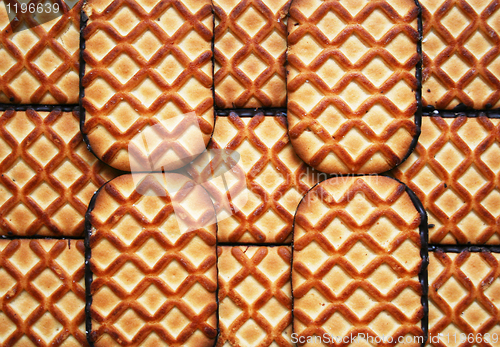 Image of Sweet cookies with chocolate as background