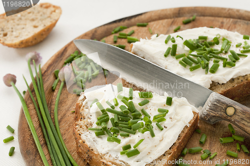 Image of bread with cream cheese and chives