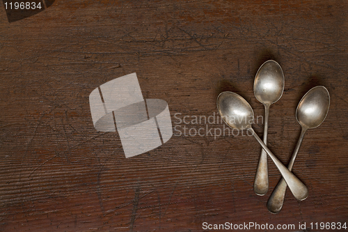 Image of vintage silver spoons with patina