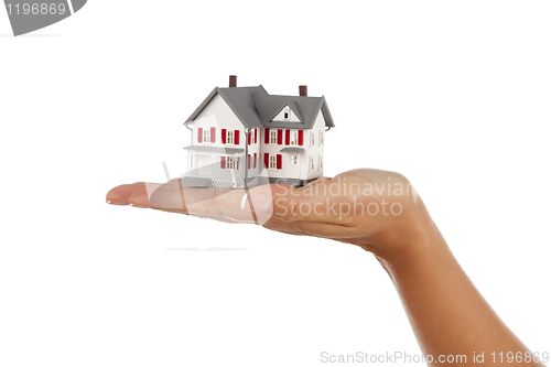 Image of House in Female Hand on White