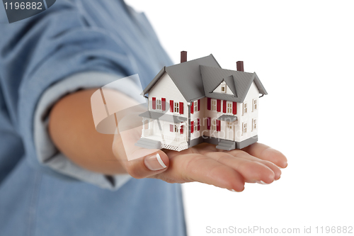 Image of House in Female Hand on White