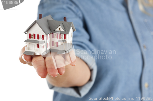 Image of House in Female Hand on White